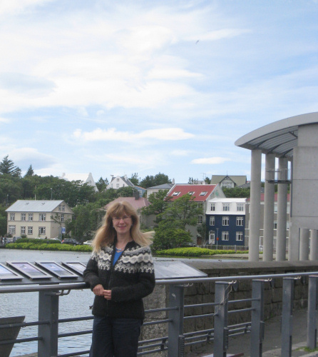 Fiona wearing an Icelandic jumper outside City Hall, Reykjavik