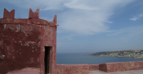on the ramparts of the Red Tower in Malta overlooking Gozo