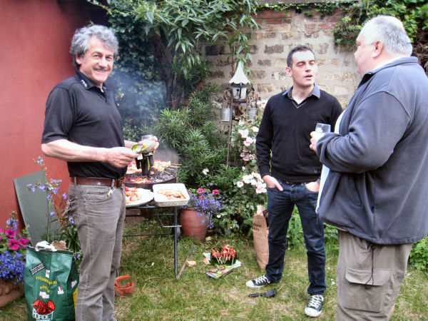men at the barbecue