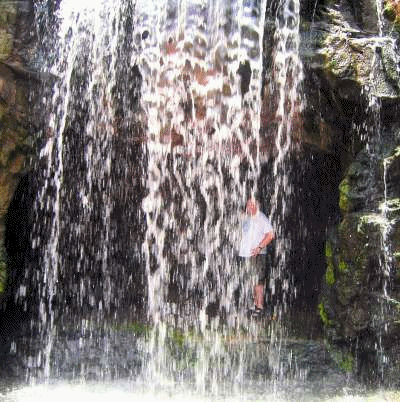 John tried to cool off behind the waterfall?