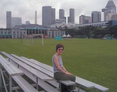Fiona at the Padang.  This rectangular playing field is right in the middle of the city