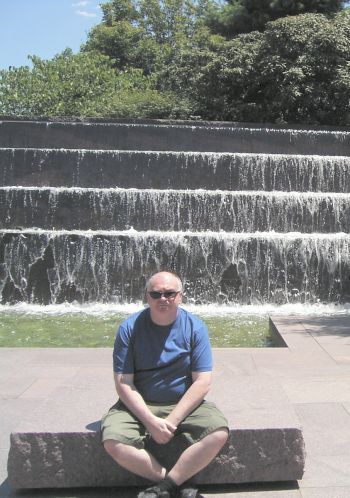 John next to the waterfalls at the FDR memorial