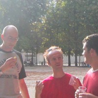 Mike, Ollie and Andy discuss tactics at the pétanque tournament