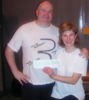 Fiona and John get ready to play volleyball