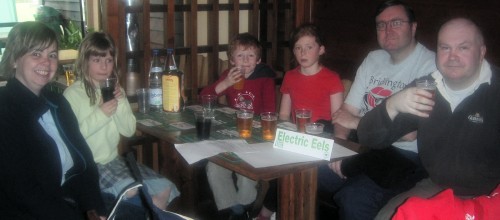 the team enjoying a celebration beer