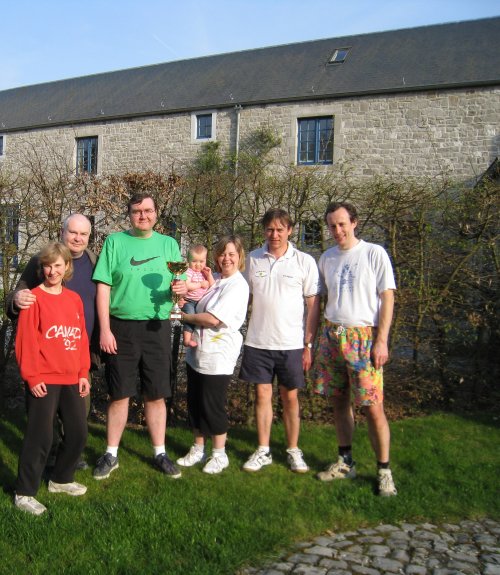 Electric Eels volleyball team win a trophy.