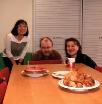 April, John and Trang with the cake