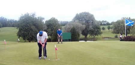 John on the putting green.