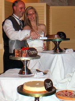 Bob and Christine cutting the cake
