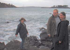 Fiona, Neil and April scramble over the rocks at Saint Briac, Brittany