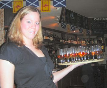 Julia offered the guests a wee dram