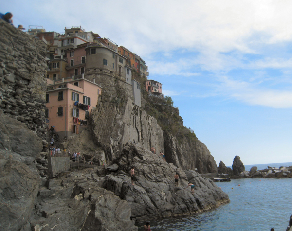 building clinging to cliffs