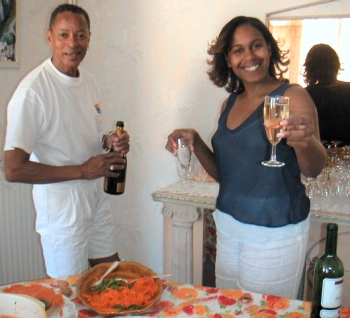 Jon and Valerie open the champagne