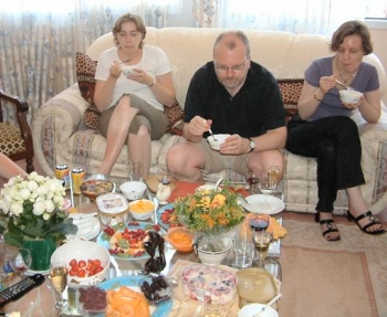 Sandrine, John and Coryn tuck in