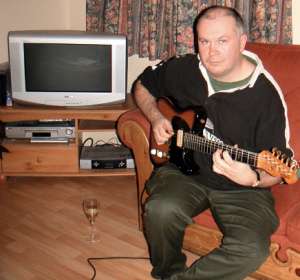 Johnny plays guitar