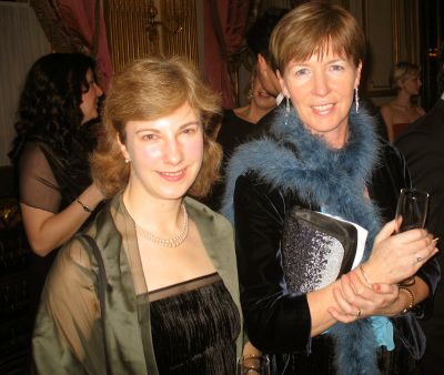 mingling with guests and sipping champagne