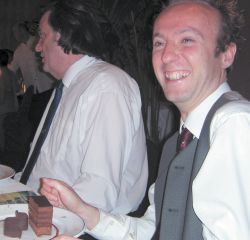 Ollie smiles in delight at the chocolate desert