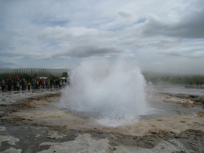 Strokkur hot spring errupting