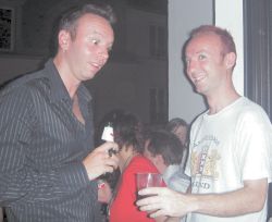 One can only wonder what's in Ollie's glass!