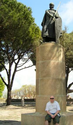 John by the statue of Saint George in Lisbon