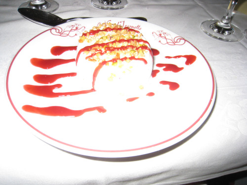 nougat ice cream with a raspberry coulis