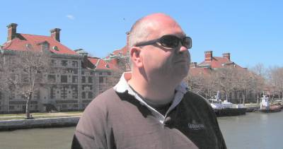 John opposite the hospital on Ellis Island