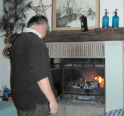 John stands back to admire the flame