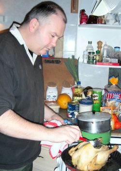 John basting the chicken