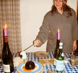 April lit the Christmas Pudding