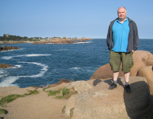 John clambering the rocks at Ploumanch