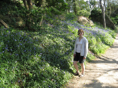 Fiona in a woodland glade full of bluebells