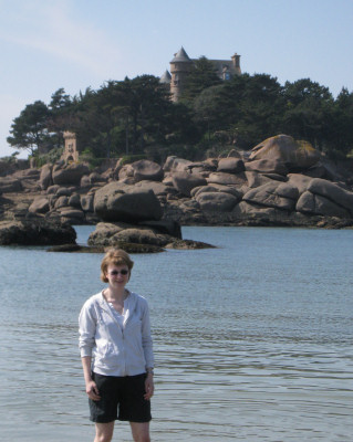Fiona paddling in the English Channel at Ploumanach,