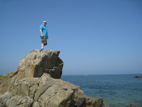 John once again can't resist climbing the tallest rocks at the Sillon de Talbert