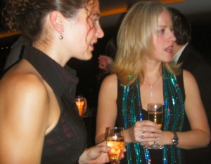 Alison and Liz enjoy a glass of champagne